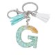 thumbnail image 1 of Llavero de letras con borlas verdes | Colgante de cristal acrílico | Lámina de oro, pegamento en gota, joyería de piedra engrosada | Amuleto de bolso con estilo, accesorio para mochila | 1 pieza, 1 of 2