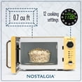 thumbnail image 2 of Nostalgia NRMO7YW6A Horno de microondas retro compacto para encimera, 0.7 Cu. 700 vatios con visualización digital LED, cerradura para niños, interior fácil de limpiar, amarillo, 2 of 5