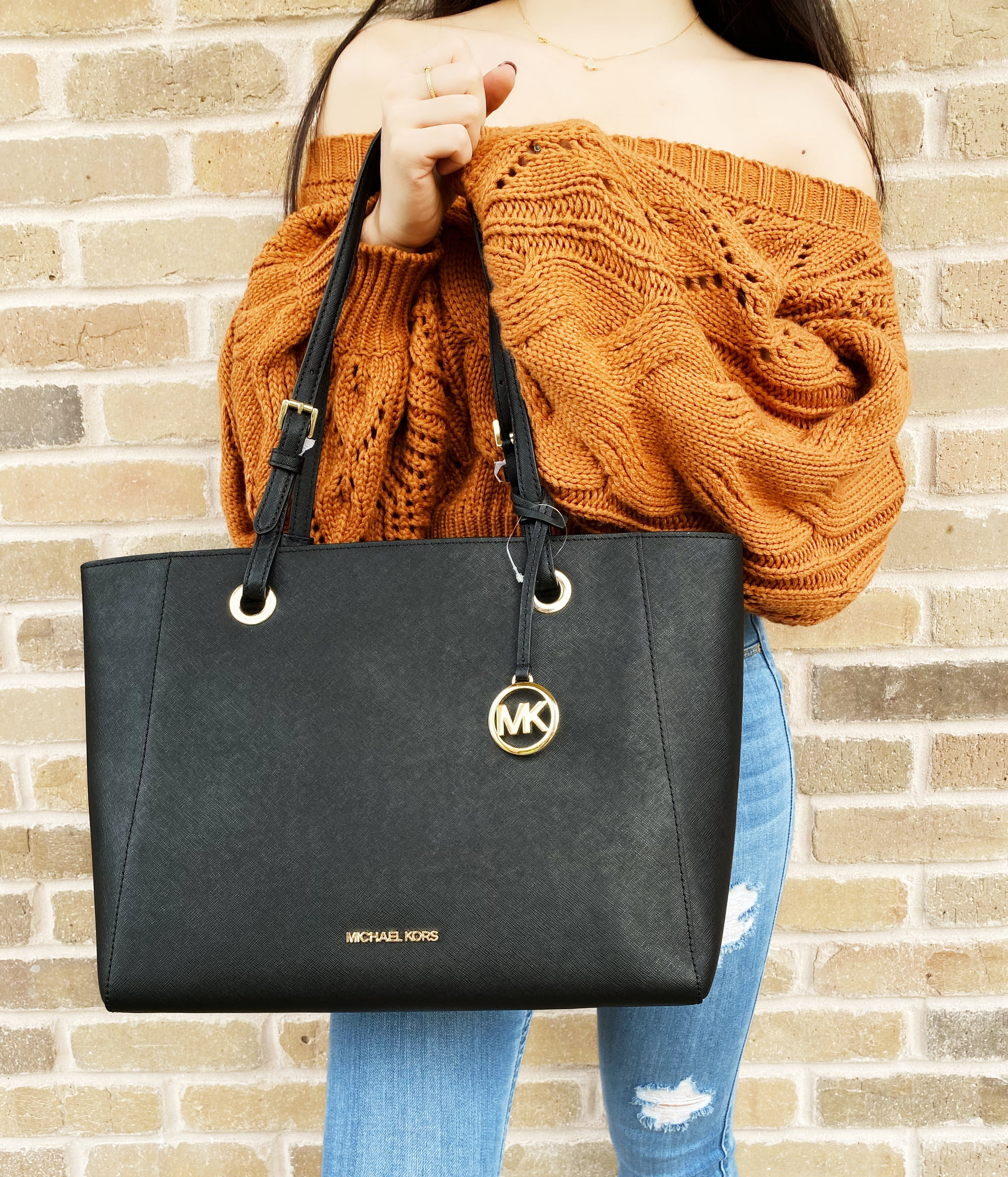 MK black handbag with gold hardware