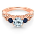thumbnail image 2 of Gem Stone King 18K Rose Gold Plated Silver Sky Blue Topaz Blue Sapphire and White Moissanite Engagement Ring for Women (1.57 Cttw, Gemstone November Birthstone, Round 6MM and 3MM, Size 9), 2 of 4