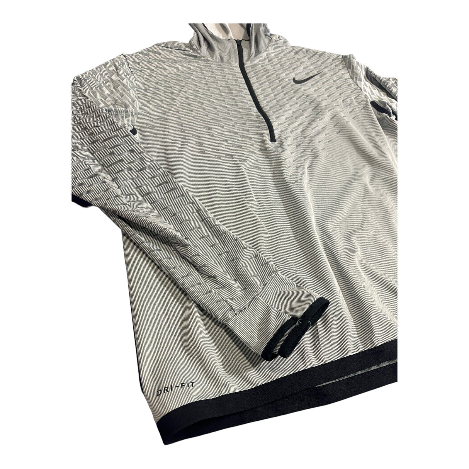 silver nike shirt