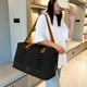 thumbnail image 5 of Bolsa de viaje plegable | Bolsa ligera de gimnasio de 30 l, resistente al agua, con asas resistentes y correa para equipaje | Bolsa compacta y plegable para llevar de noche y de fin de semana, ideal, 5 of 6