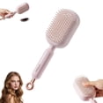 thumbnail image 1 of Cepillo antiestático desenredante para cabello húmedo y seco con mango ergonómico y diseño ideal para viajes. Color rosa., 1 of 5