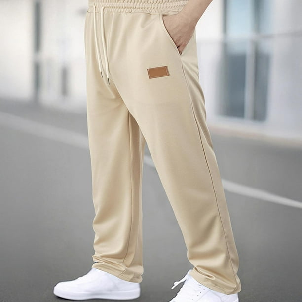 Pantalones largos para hombre, lisos, a la moda, informales, con bolsillos, cintura elástica, pantalones deportivos largos de poliéster para hombre.