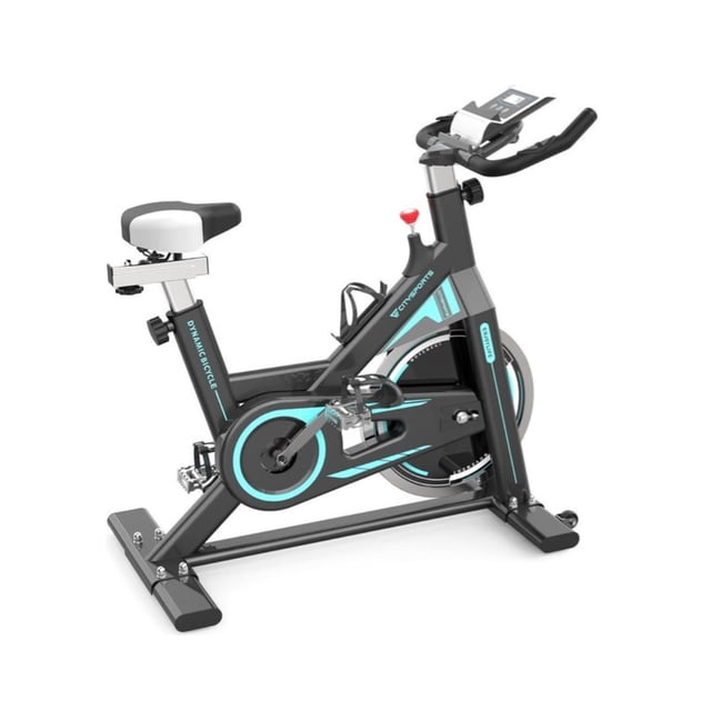 bicicleta de spinning citysportts cs10 - spin bike city sports cs10 Bicicleta fija gris, vista lateral 3/4 con cuadro tipo A; sillín acolchado y ajustable, manubrio con consola y portavasos, volante de inercia visible, pedales con correas y ruedas de transporte en la base. Soporta hasta 120 kg; a menudo usada para entrenamientos indoor en casa.