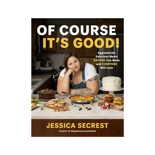 Of Course It’s Good Everyday Home Cooking Recipe Book – Easy & Flavorful Meals for Beginners | Everyday Cookbook (Hardcover, Coil). The cover depicts a kitchen countertop with an assortment of dishes, such as cookies, a layered cake, and savory meals, showcasing the book's emphasis on quick, delicious, and beginner-friendly recipes.