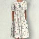 thumbnail image 4 of Vestidos estampados florales plegables de manga corta con cuello redondo informal de verano para mujer Fridja bnh2904, 4 of 9