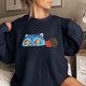 thumbnail image 5 of Moonsky Sudadera pop Demon Hun/er, sudadera Huntrix con cuello redondo, jersey de manga larga para mujer y hombre, ropa de calle, moda urbana (Azul marino XL), 5 of 5