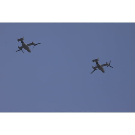 LAMINATED POSTER Two MV-22B Ospreys fly over Wing One Royal Thai Air Force Base, Nakhon Ratchasima, Kingdom of Thaila Poster Print 24 x 36