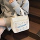thumbnail image 1 of Organizador de ropa, almacenamiento de armario, bolso de moda, comercio exterior, ocio, viaje, bolsa de almuerzo, venta al por mayor, coreano, limpio, pequeño, fresco, todo a juego, bolso de lona, bol, 1 of 6