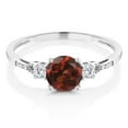 thumbnail image 2 of Gem Stone King 10K White Gold Red Garnet White Created Sapphire and White Diamond Accent 3-Stone Engagement Ring for Women (1.14 Cttw, Round 6MM, Gemstone January Birthstone, Size 8.5), 2 of 5