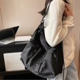 thumbnail image 3 of Nylon crossbody bag with multiple pockets and adjustable straps for added comfort., 3 of 5