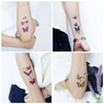 thumbnail image 3 of Tatuaje temporal de mariposa a prueba de agua, pegatina de tatuaje corporal colorida para cara, brazo, pierna, calcomanía alada para fiesta falsa, 3 of 4