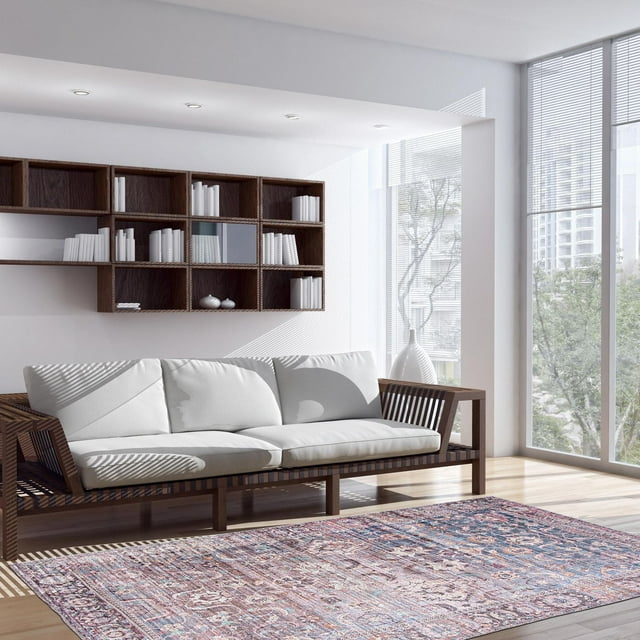 Modern living room showcasing ECARPET Oriental Indoor Area Rug from Sultan Collection under a wooden frame sofa with white cushions, highlighting eco-friendly, machine washable flatweave carpet design.