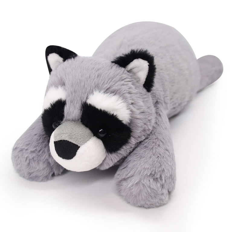 raccoon hugging stuffed animal