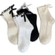 thumbnail image 1 of Zhuge Calcetines con lazo y volantes para mujer, informales, de algodón suave y transpirable, color negro y blanco, 4 pares, 1 of 5