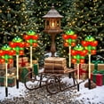 thumbnail image 4 of Hyknon 5 Pack Solar Christmas Pathway Lights, Warm LED Waterproof Outdoor Stake Lights with Auto On Dusk, Wire Free Garden Ground Lamps for Yard Walkway Holiday Decor, 4 of 6