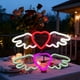 thumbnail image 1 of Luz de neón con corazón de ala de San Valentín – Decoración mural LED, rosa o rojo, 14,17x4,72 pulgadas, USB y a pilas, decoración para fiestas interiores al aire libre, 1 of 6