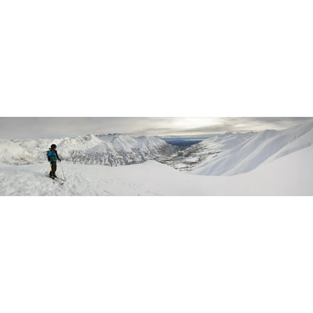Take A Pic A Backcountry Skier Takes A Moment To Enjoy The View From The Top Of Hatcher Pass Alaska Poster Print by Christopher S Miller Design Pics ()