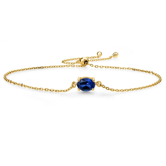 Gem Stone King 18K Yellow Gold Plated Silver Blue Created Sapphire Solitaire Bracelet for Women (1.00 Cttw, Oval Cut 7x5mm)