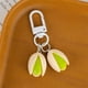 thumbnail image 4 of Simulation Pistachios Keychains Resin Simulation Pistachios Keychains Small Gift Bag Decoration Pendant Metal Keychains, 4 of 6