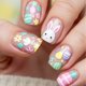 thumbnail image 4 of Uñas postizas de conejito de Pascua: diseños florales y de conejito con adhesivos para primavera y Pascua. 24 uñas postizas., 4 of 9