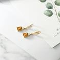 thumbnail image 4 of Gem Stone King 18K Yellow Gold Plated Silver Yellow Citrine White Moissanite and White Topaz Dangle Earrings for Women (5.33 Cttw, Gemstone November Birthstone, Octagon 9X7MM), 4 of 5