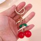 thumbnail image 3 of LLavero de cereza de cristal para mujer y hombre, colgante creativo de fruta, joyería artesanal, 3 of 4
