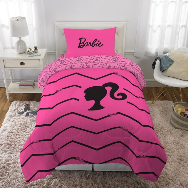 Bright pink twin/full comforter and matching pillowcase featuring black chevron stripes, a large Barbie silhouette in the center of the comforter, and 'Barbie' text on the pillowcase.