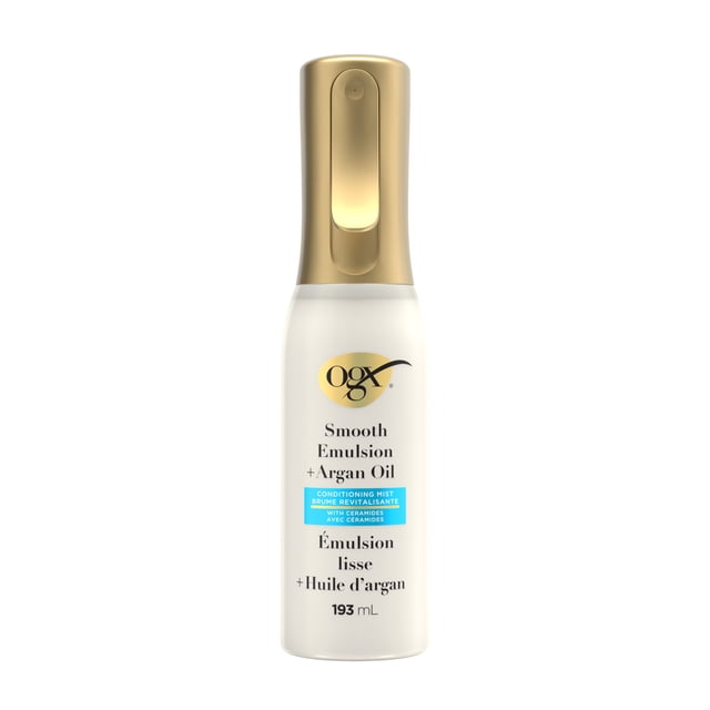 OGX Smooth Emulsion + Argan Oil Conditioning Hair Mist 193 ml bottle with gold spray nozzle, water-based formula with ceramides and argan oil for 4x smoother hair, damage repair, anti-frizz benefits, and heat protection up to 230°C, suitable for daily hair conditioning.