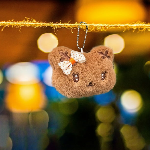 Adorno colgante con peluche de oso de dibujos animados que chirría, un amigo suave para los niños