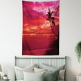 thumbnail image 4 of Ocean Tapestry, Sunset View from a Tropical Island Beach with Silhouette of Palm Tree on the Shore Art Print, Wall Hanging for Bedroom Living Room Dorm Decor, 60W X 80L Inches, Red, by Ambesonne, 4 of 5
