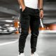 thumbnail image 4 of Pantalones largos de moda para hombre, casuales, de color sólido, con bolsillos y cremallera, cintura elástica, de poliéster., 4 of 5