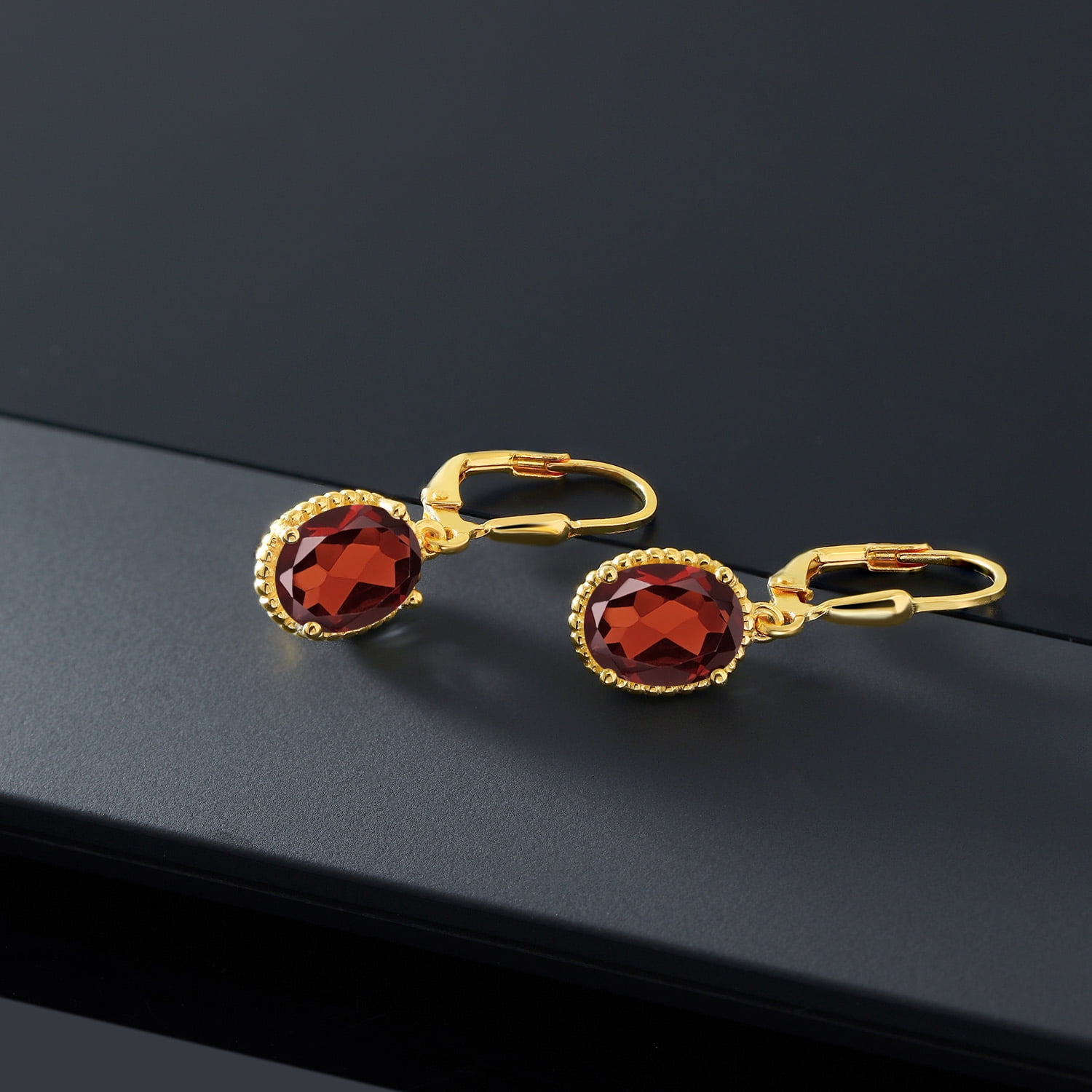 Gem Stone King 18K Yellow Gold Plated Silver Red Garnet Leverback Dangle Earrings for Women (3.60 Cttw, Gemstone January Birthstone, Oval 9X7MM)