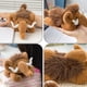 thumbnail image 4 of Lindo muñeco de peluche con orejas grandes y colmillos | Juguete suave antiestrés | Reposamuñecas de escritorio y llavero decorativo para bolso | 24 cm de largo (acostado), 4 of 6