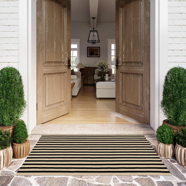 Alfombra de exterior LEEVAN a rayas blancas y negras, lavable, 120 x 180 cm