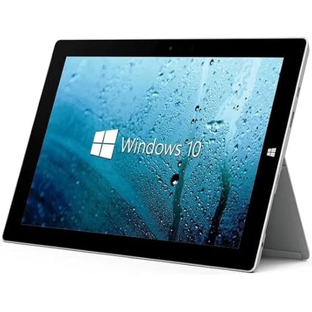 tableta microsoft 3 10.8 64gb plateada y 2gb ram (reacondicionado) Reacondicionado — Vista 3/4 frontal de la tablet Microsoft con pantalla 10.8" (1920x1280) mostrando Windows 10; bisel negro y cuerpo plateado con soporte trasero desplegado; especificaciones en ficha: 64 GB almacenamiento, 2 GB RAM, Intel Atom x7-Z8700, USB 3.0, Bluetooth 4.0 y lector microSD.
