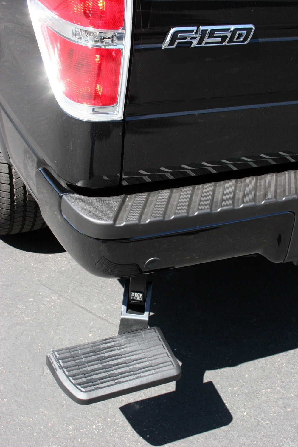AMP Research 75302-01A BedStep Retractable Bumper Step for 2006-2014 Ford F-150 & Raptor Excludes Flareside 