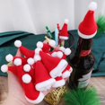 thumbnail image 3 of 50/1 Uds Mini gorros de Papá Noel funda para botellas de vino taza sombrero para paleta tenedor cuchillo bolsa de cubiertos para Navidad decoración de mesa de cena de fiesta de año nuevo, 3 of 4