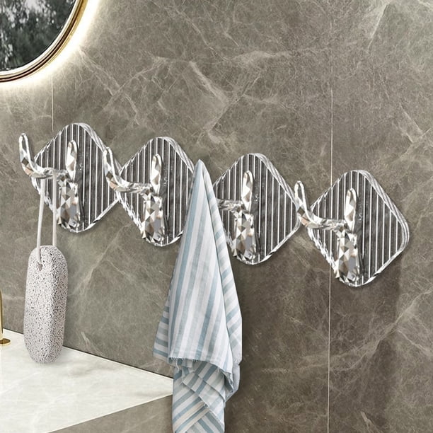 4 ganchos de asta de ciervo con adhesivo resistente para uso doméstico. No requieren perforaciones. Ideales para colgar en la pared de la cocina y el baño, así como para la entrada y el recibidor.