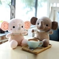 thumbnail image 3 of Elefante de peluche de 22 cm con forma de mono, postura sentada, elefante bebé de nariz larga, regalo de cumpleaños para niños y amigos, 3 of 4