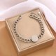 thumbnail image 1 of Pulsera de trébol de acero de titanio europea y americana con incrustaciones de concha, pulsera con colgante, pulsera de diseño avanzado que no se decolora, 1 of 1