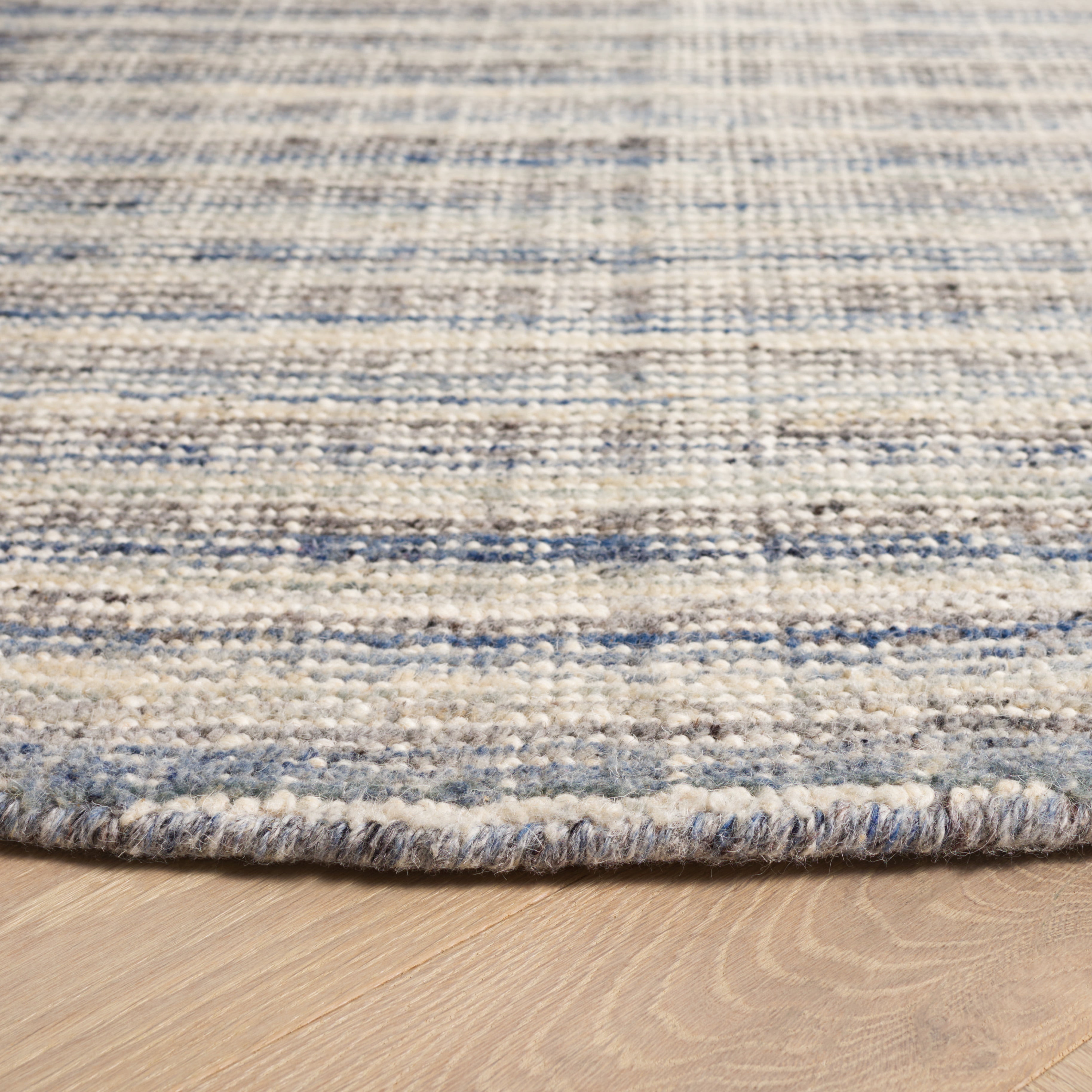 Safavieh Mirage Toby Solid Area Rug, Ivory/Blue, 6' x 6' Round