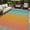 Orange and Blue, variant on SUNDEREY Outdoor Rug 5'x8', Waterproof Reversible Plastic Straw Mat for Patio, RV & Camping - Non-Slip All-Weather Carpet for Beach, Poolside & Deck, Sunset Pattern