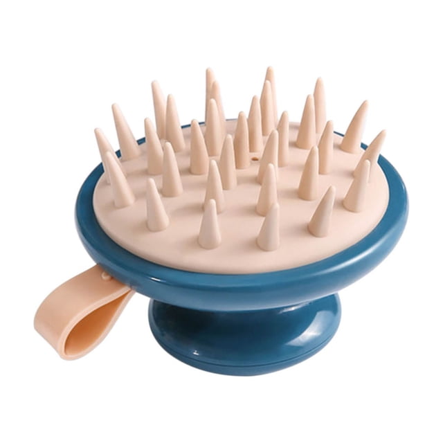 Cepillo de masaje para cabello con base de silicona suave - ideal para uso en seco o mojado, ayuda a estimular el cuero cabelludo y reduce la estática. Diseño ergonómico en color azul.
