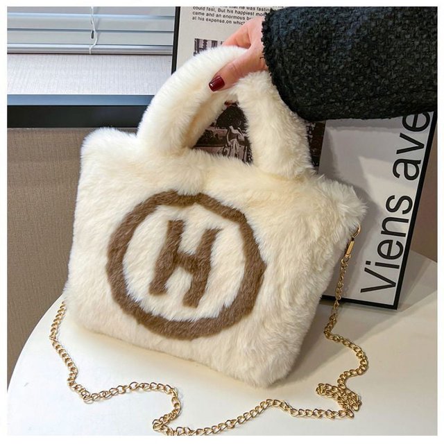 Bolso de mano con textura de nicho similar a la lana para otoño e invierno, bolso de mano para niña de moda