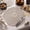 Grey, variant on Fennco Styles Two-Tone Sunburst Woven Table Placemats 15 x 15 Round, Set of 4 - Slate Paper Table Mats for Home Décor, Dining Table, Banquets, Family Gathering and Special Events