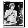thumbnail image 2 of Historic Framed Print, Wong Ruth Mae Moy, a young Chinese girl who survived the Canton bombings, is working on an aircraft engine part, 17-7/8" x 21-7/8", 2 of 9