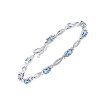 RYLOS Tennis Bracelet with 6x4MM Birthstone Gemstones & Diamonds Sterling Silver - Adjustable to 7-8" Blue Topaz Jewelry for Women Friendship Bracelets