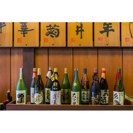 Sake Bottles in a Sake Brewery, Takayama, Gifu Prefecture, Japan Print Wall Art By Stefano Politi